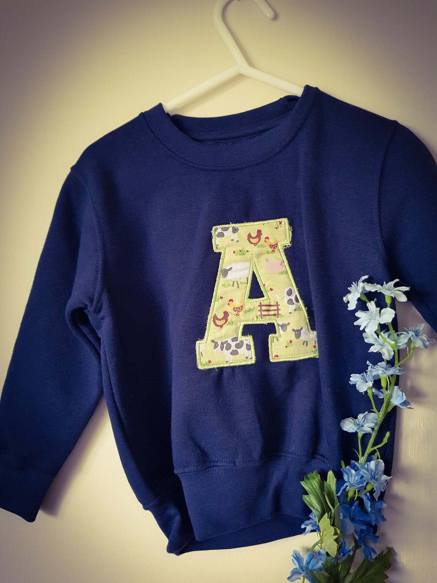 "A" initial navy sweatshirt